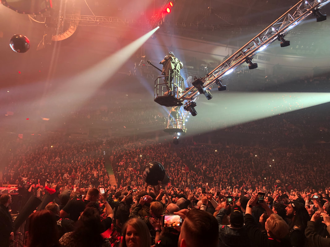 Arena concert with light rays